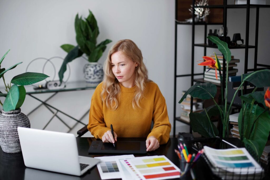 A woman working on a 3d design