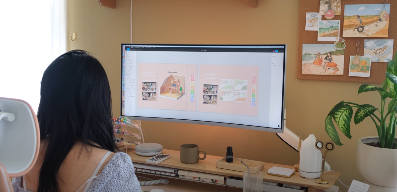 Female working on her computer, doing 3D modeling