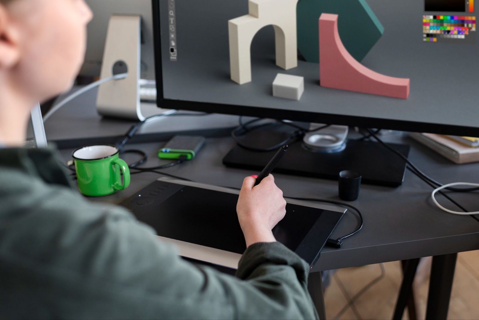 A woman working on a 3d design